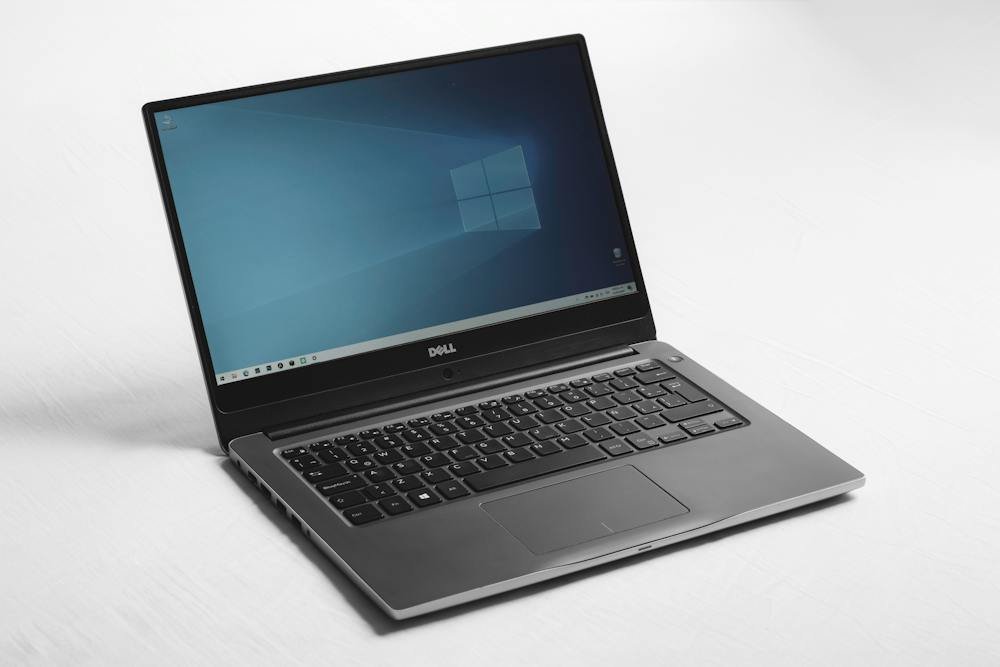 Windows laptop in a modern office representing local and cloud hybrid AI